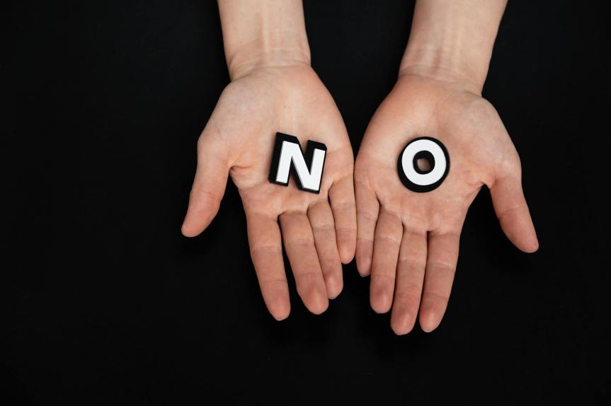 letters on person s hands